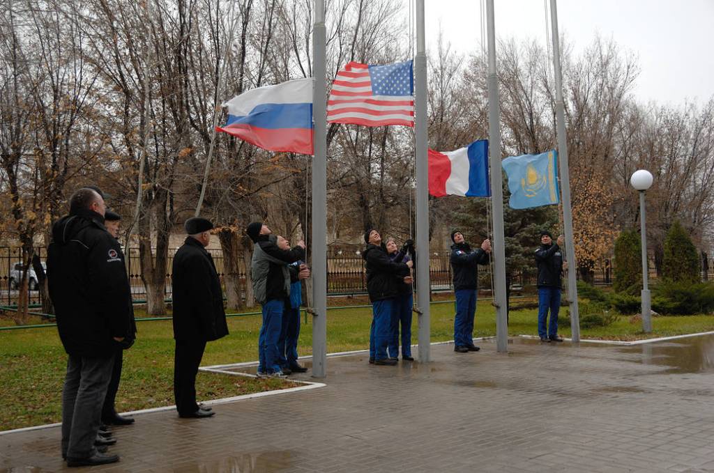 Expedition 50-51 Crew Members Raise Flags