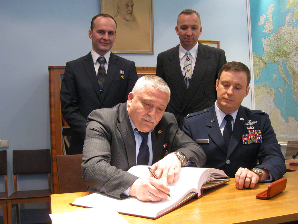 Cosmonaut Fyodor Yurchikhin Signs a Commemorative Book