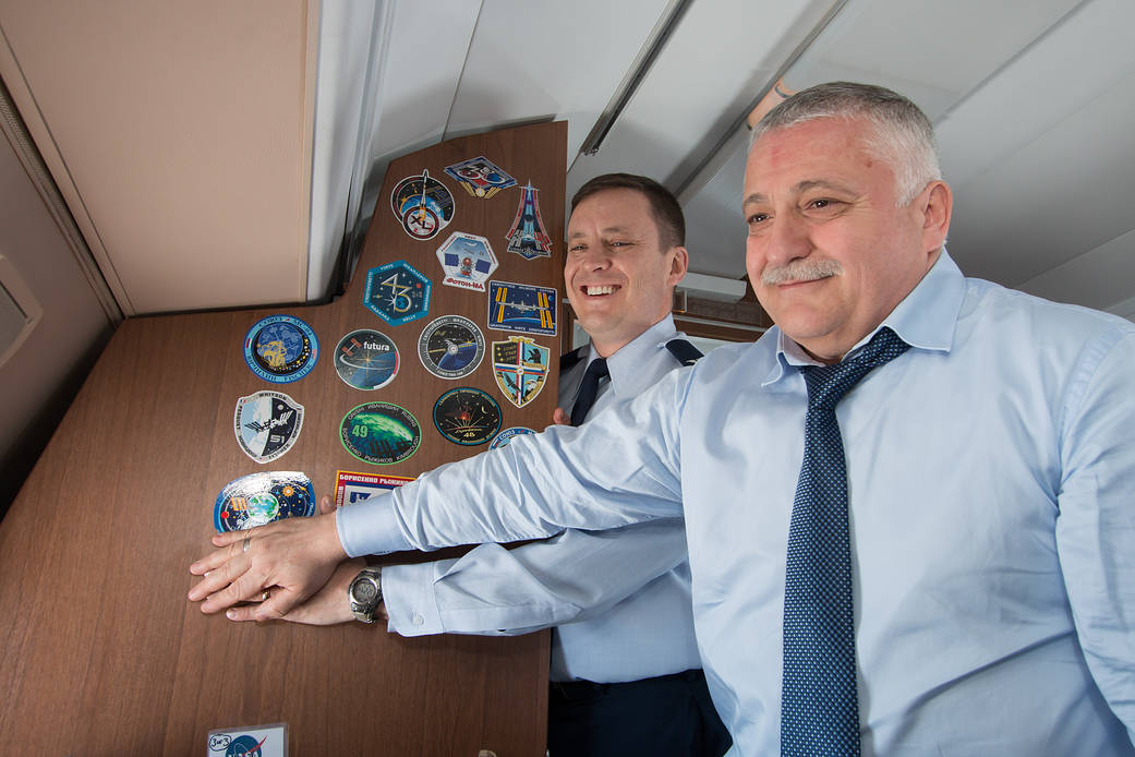 Expedition 51 Crew Aboard an Aircraft to Kazakhstan