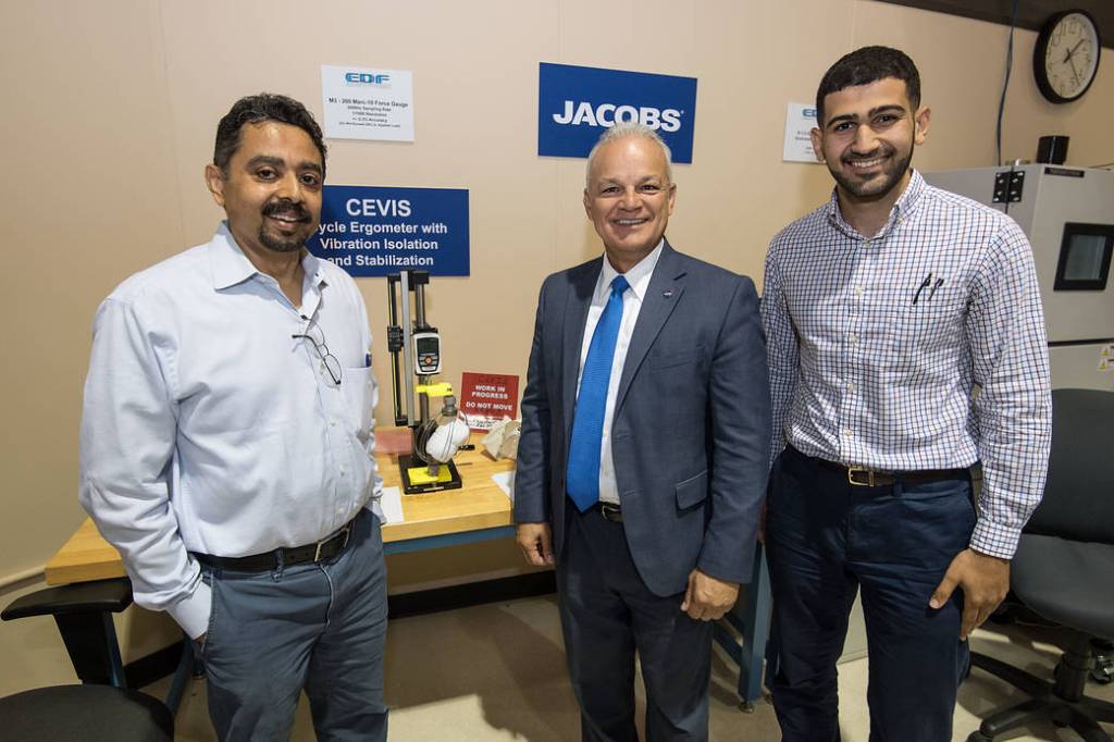 NASA Chief Technologist Douglas Terrier with Jacobs Engineers During a Tour of Jacobs’ Engineering Development Facility