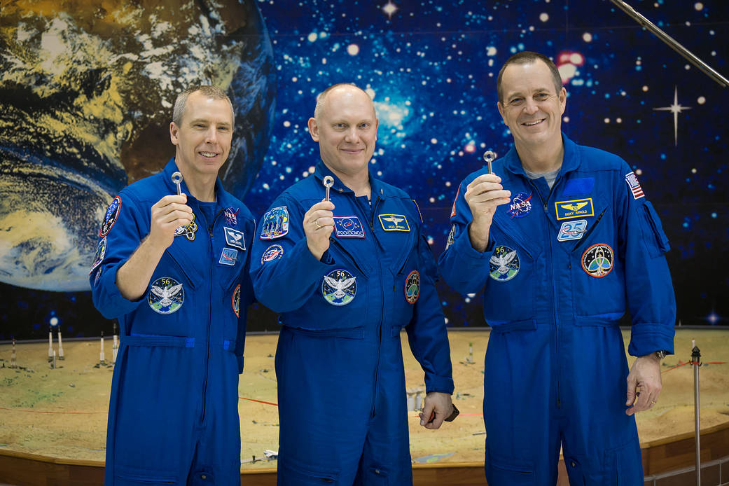 Expedition 55 Crew Displays Soyuz Booster Keys