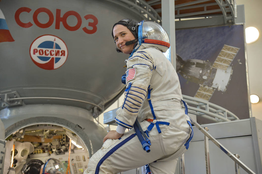 Serena Auñón-Chancellor waits to board a Soyuz simulator