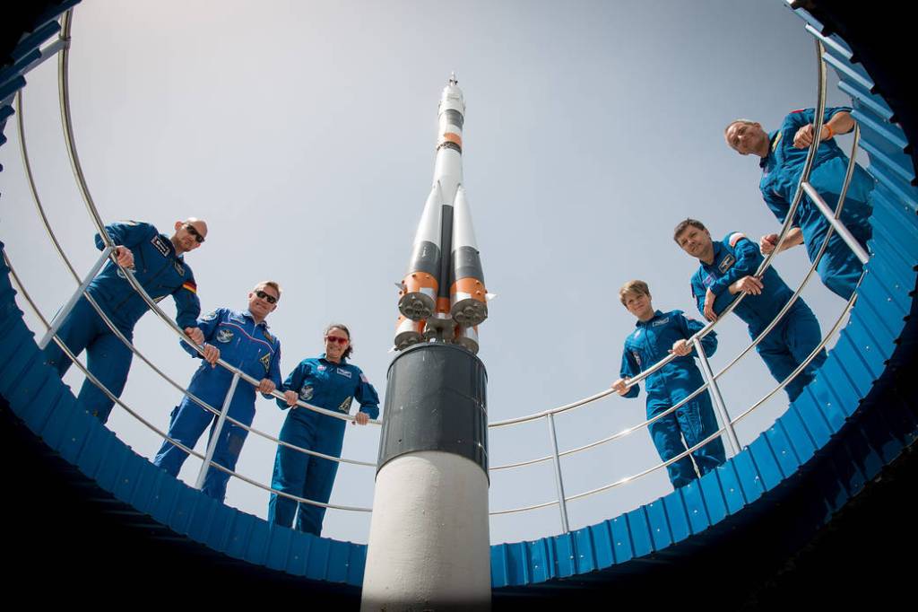 Expedition 56 prime and backup crew members pose for pictures