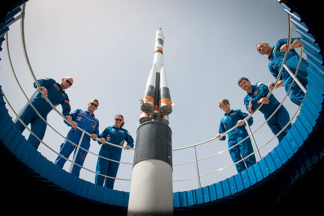 Expedition 56 prime and backup crew members pose for pictures