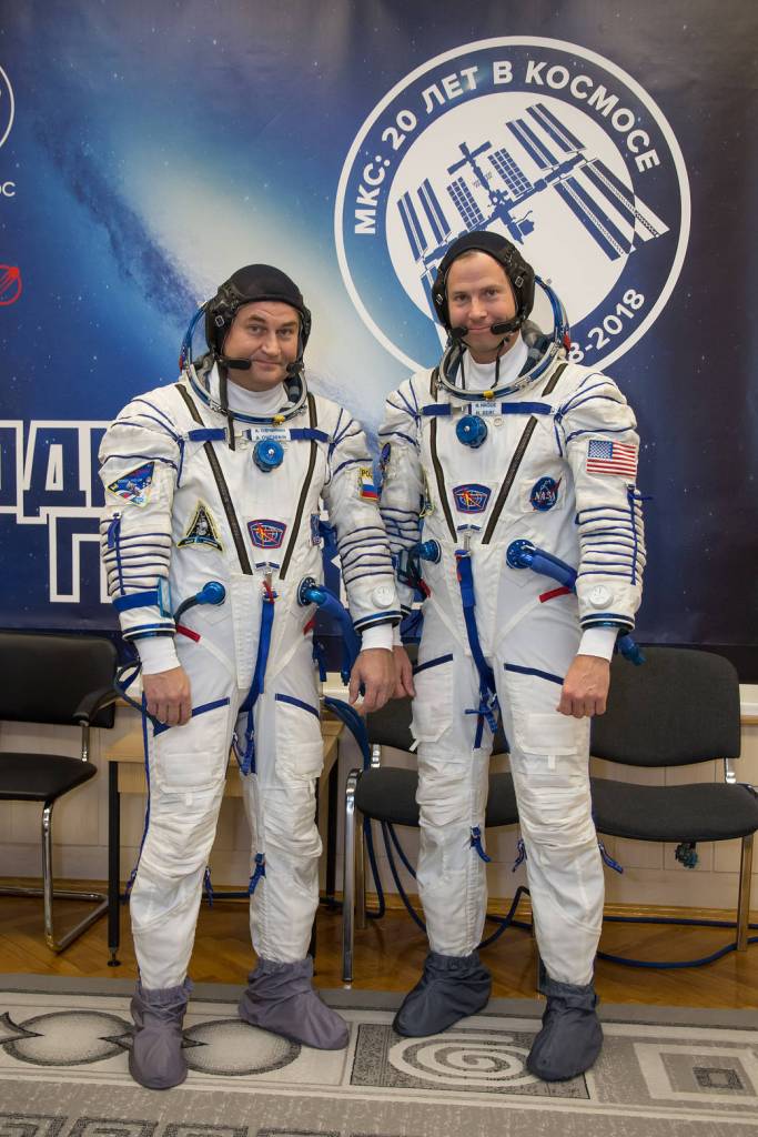 Expedition 57 crew members Alexey Ovchinin and Nick Hague in Russian Sokol launch and entry suits