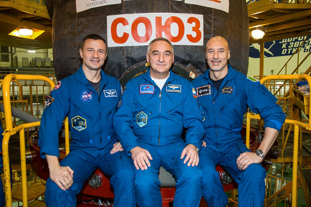Expedition 59 backup crew members pose in front of the the Soyuz MS-12 spacecraft