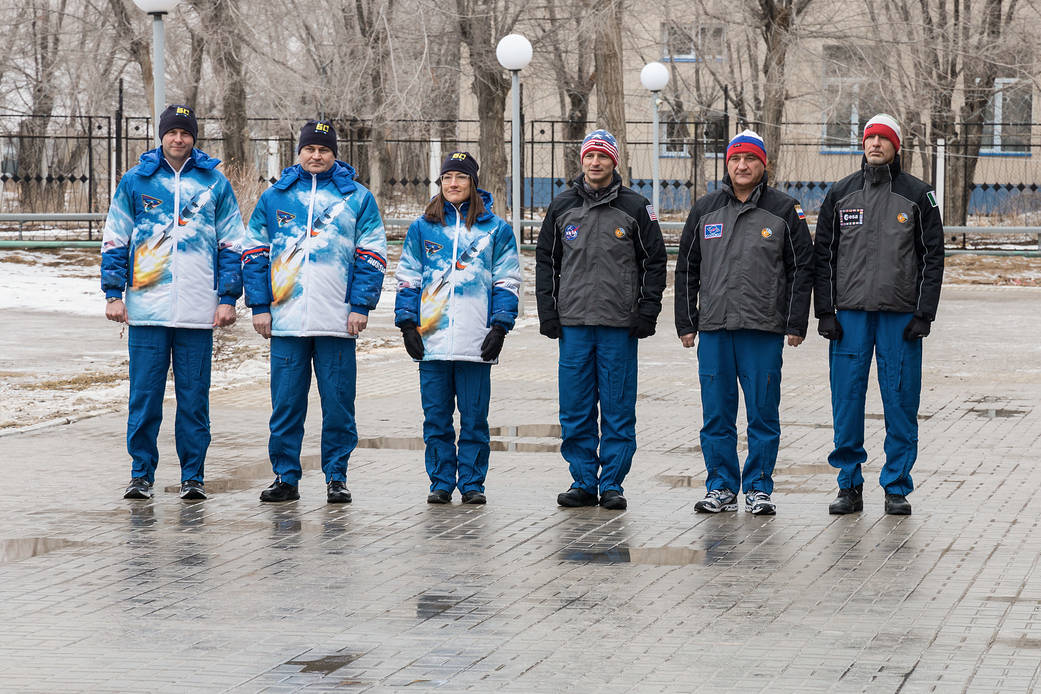Expedition 59 prime and backup crew members attend traditional flag-raising ceremonies