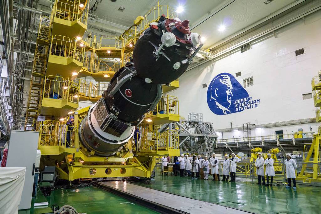 The Soyuz MS-12 spacecraft is lowered into position