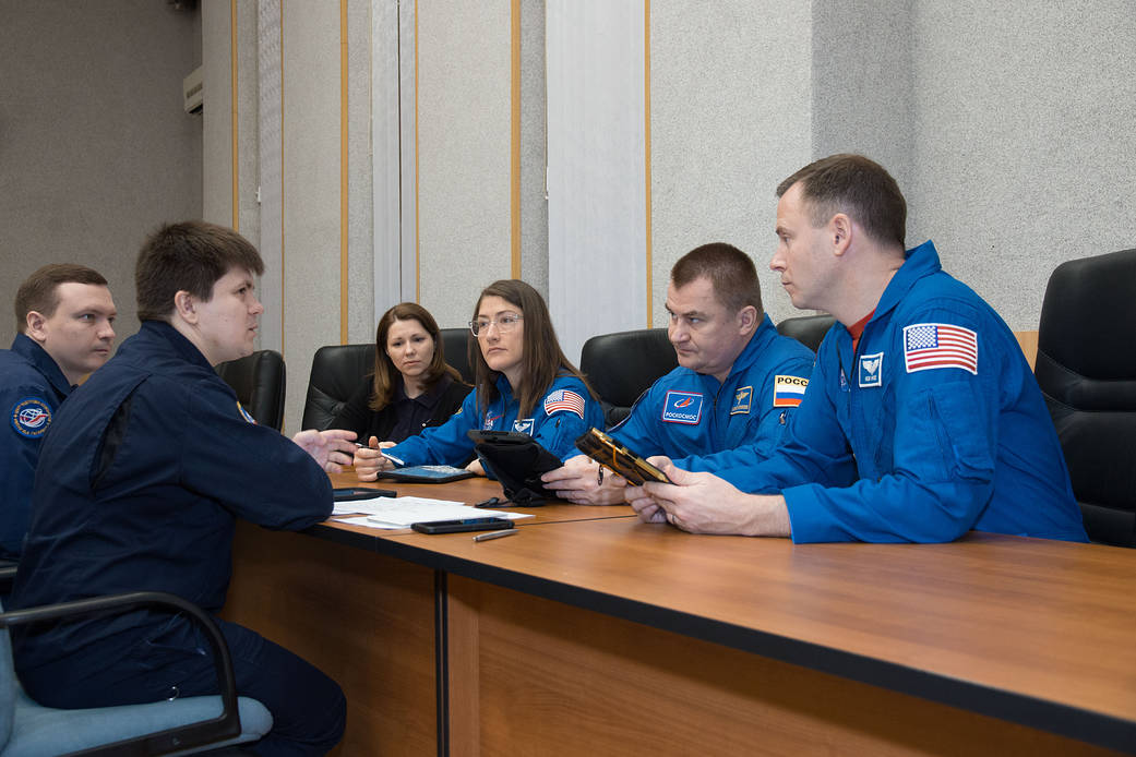 Expedition 59 crew members review flight plan activities