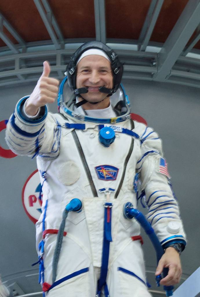 Expedition 60 crewmember Drew Morgan flashes a thumbs up