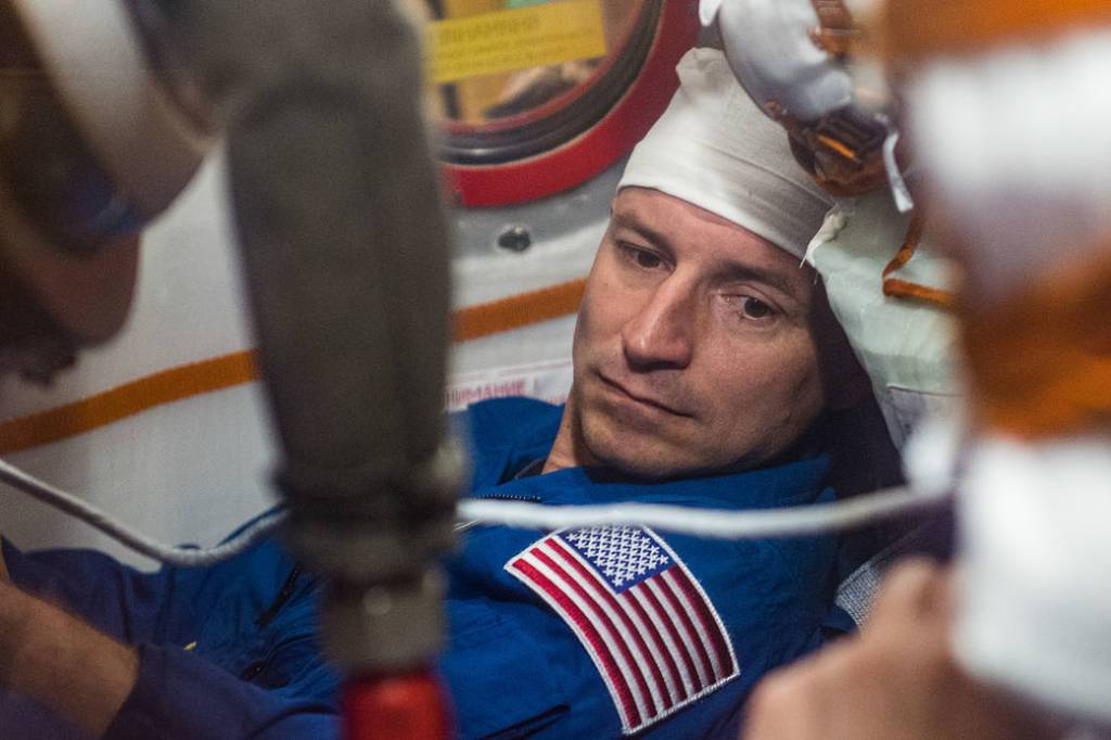 Expedition 60 crewmember Drew Morgan runs through Soyuz spacecraft procedures