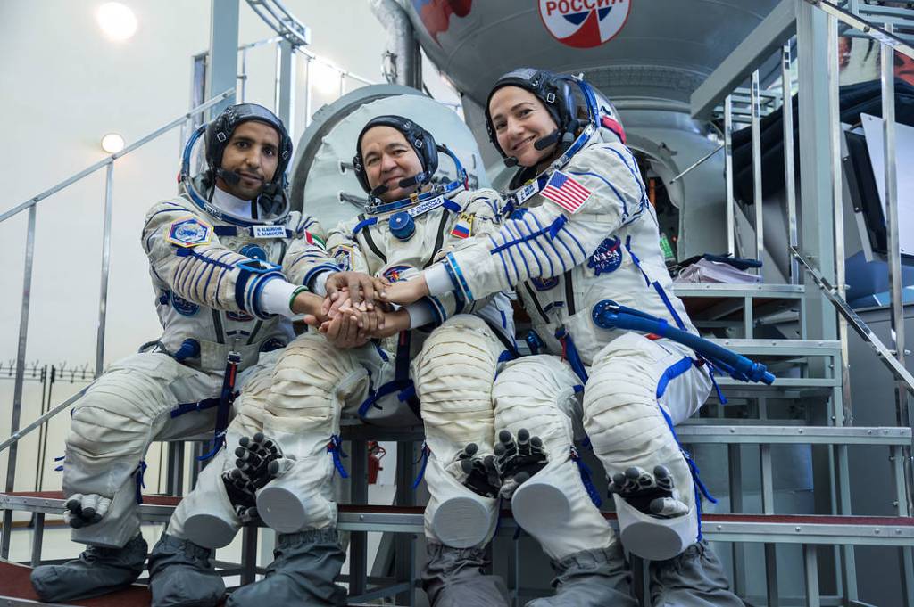 Spaceflight participant Hazzaa Ali Almansoori, Oleg Skripochka and Jessica Meir during crew qualification exams