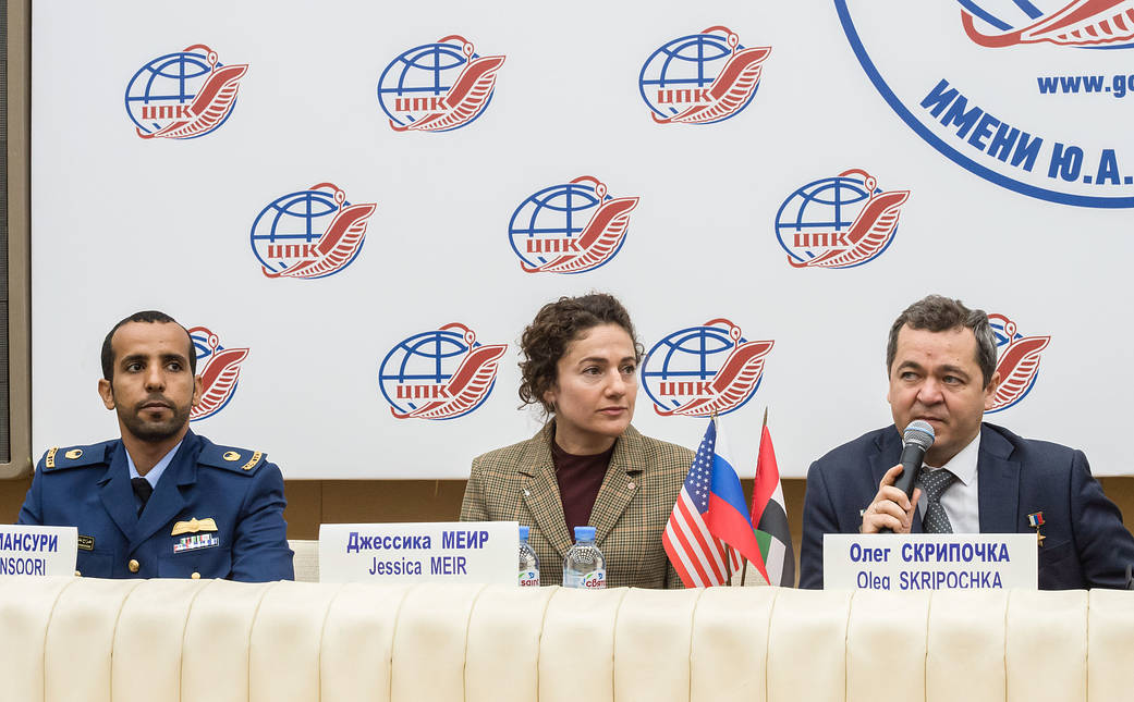 Expedition 61 crewmember Oleg Skripochka answers a reporter's question