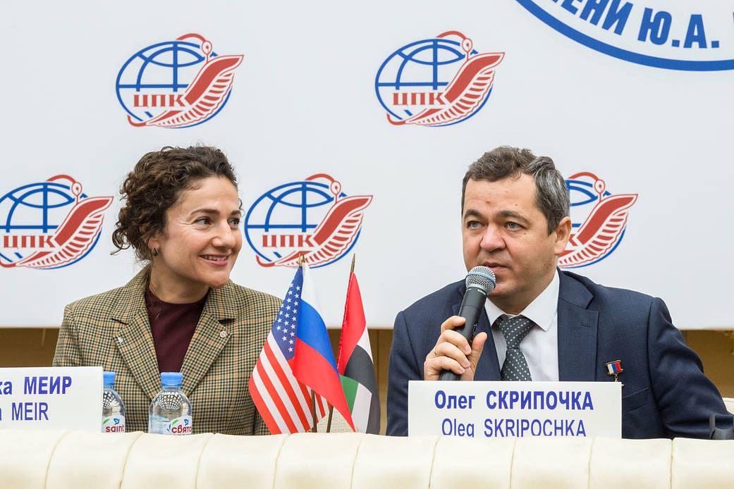 Expedition 61 crewmember Oleg Skripochka answers a reporter's question