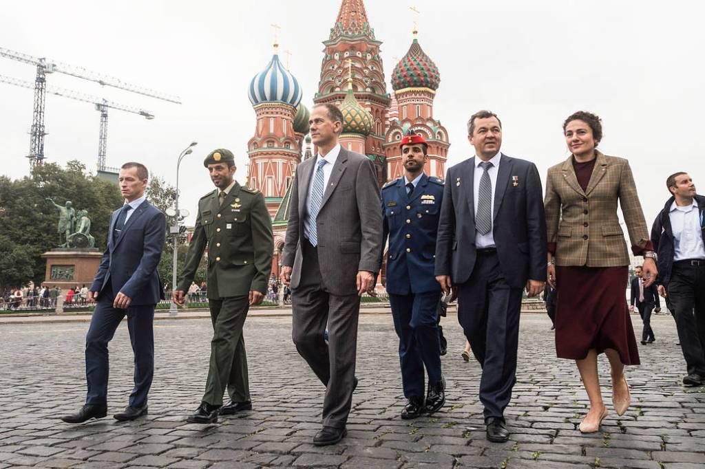 Expedition 61 crewmembers and their backups walk through Red Square in Moscow