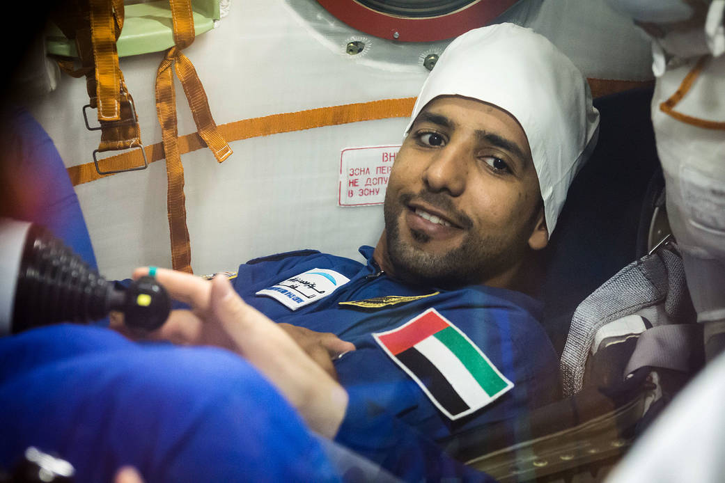 Spaceflight participant Hazzaa Ali Almansoori runs through procedures aboard the Soyuz MS-15 spacecraft