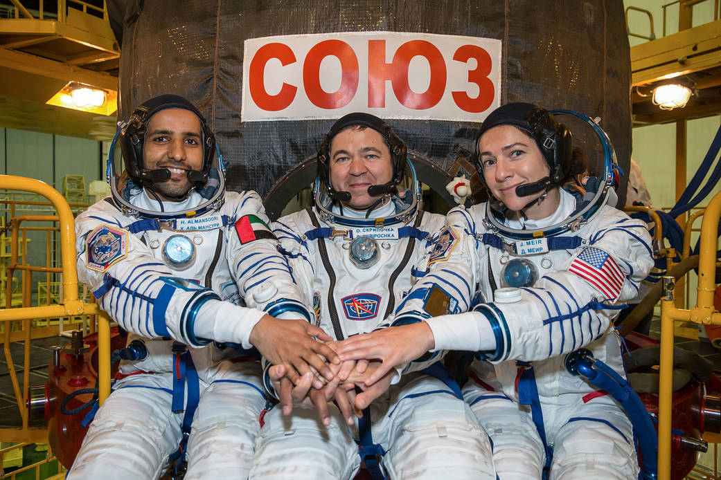 Spaceflight participant Hazzaa Ali Almansoori and Expedition 61 crewmates Oleg Skripochka and Jessica Meir