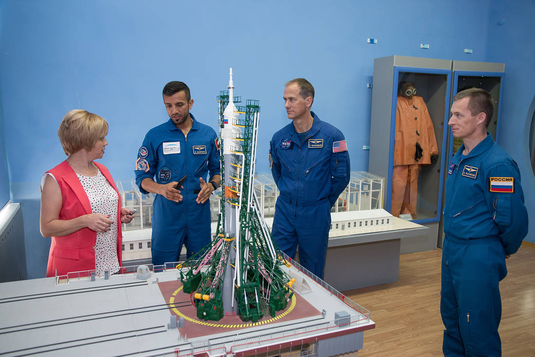 The backup crewmembers for the next launch to the space station discuss the workings of a Soyuz launch pad