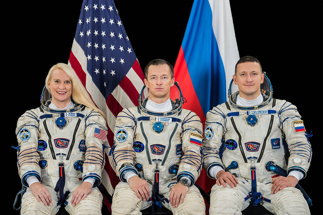 Expedition 64 crew members pose for a crew portrait