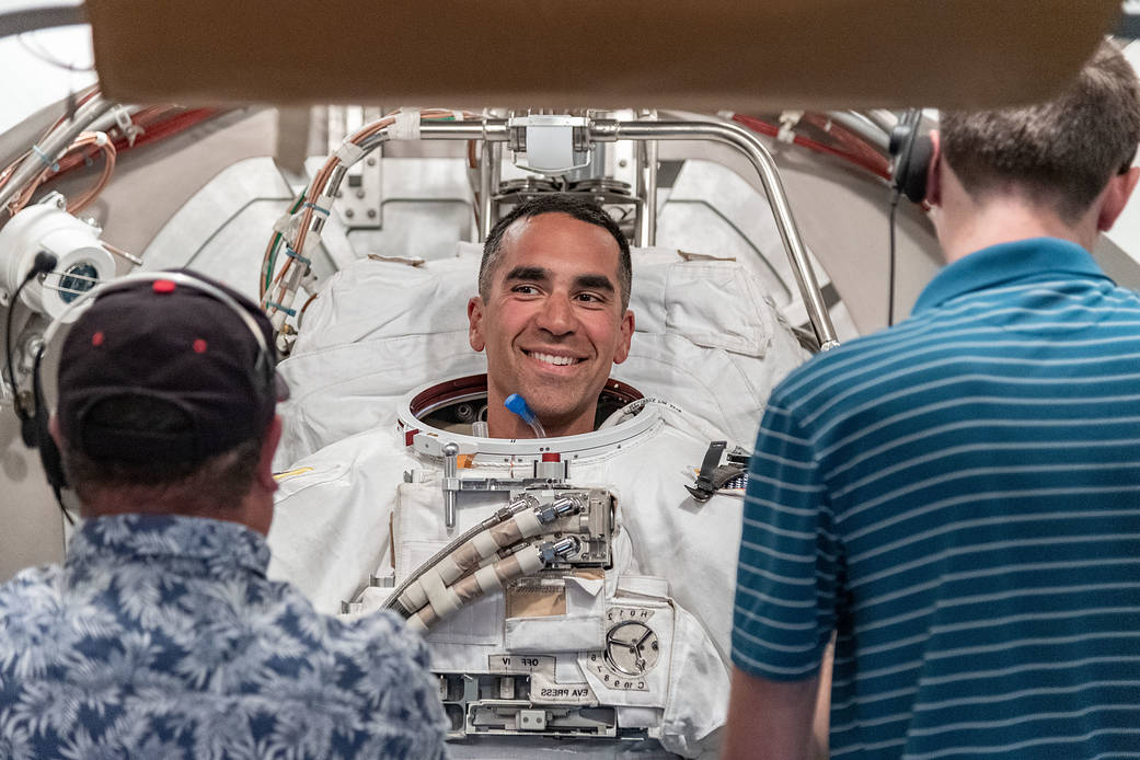 NASA astronaut Raja Chari tries on a U.S. spacesuit