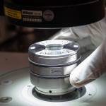 A Hayabusa2 sample canister containing sample fragments of the asteroid Ryugu is transferred from JAXA to NASA.
