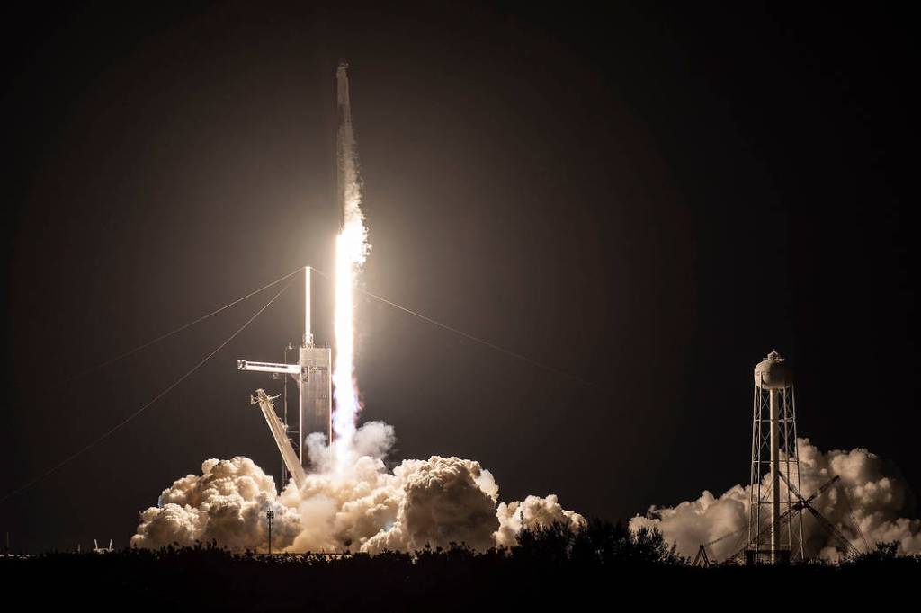 The SpaceX Falcon 9 rocket launches with the Dragon Freedom crew ship