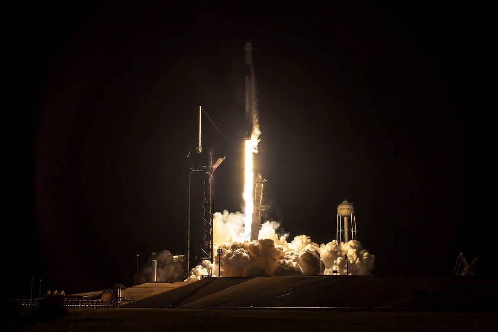 The SpaceX Falcon 9 rocket launches with the Dragon Freedom crew ship