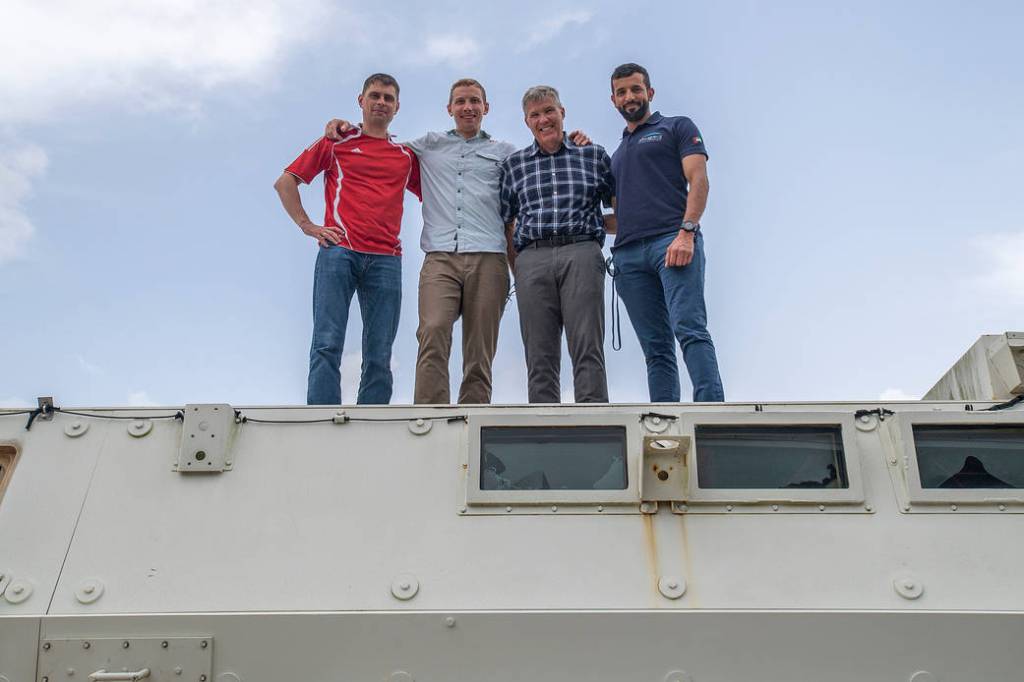 The four SpaceX Crew-6 crew members pose for a photo