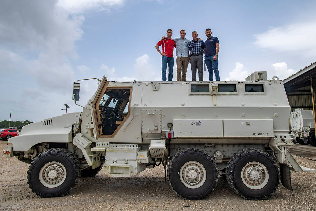 The four crew members that comprise the SpaceX Crew-6 mission pose for a photo atop an emergency egress vehicle at the Kennedy Space Center's Launch Pad 39A in Florida.