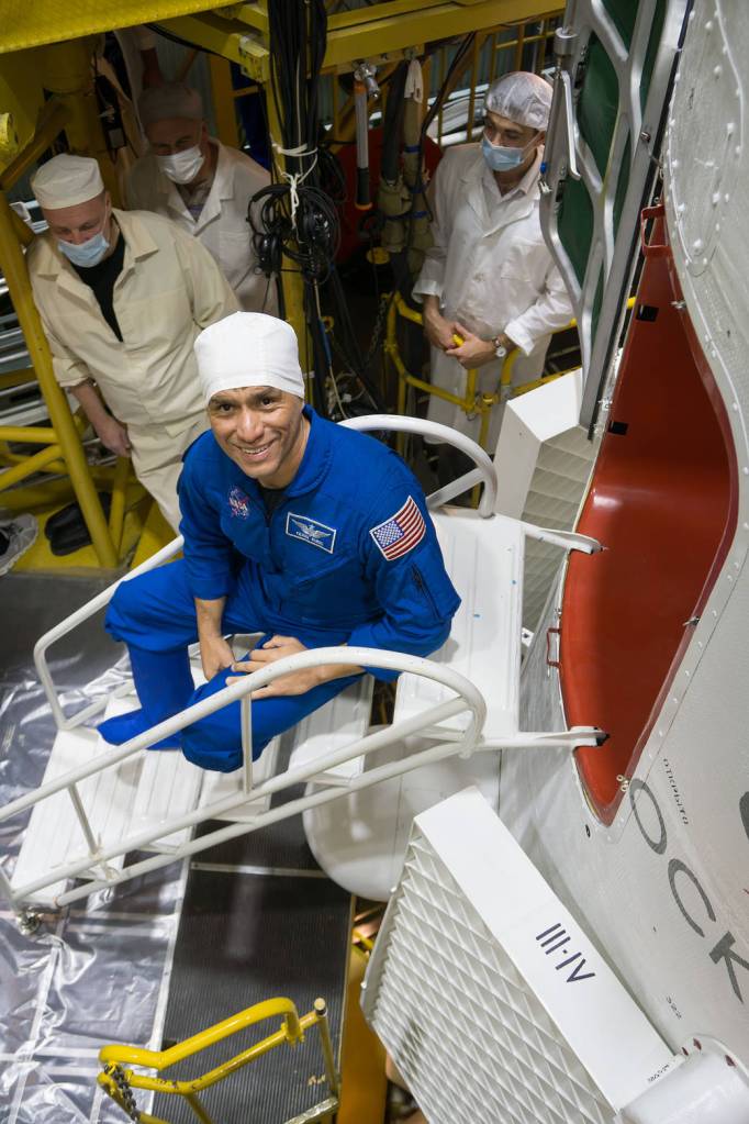 Astronaut Frank Rubio poses in front of the Soyuz MS-22 spacecraft