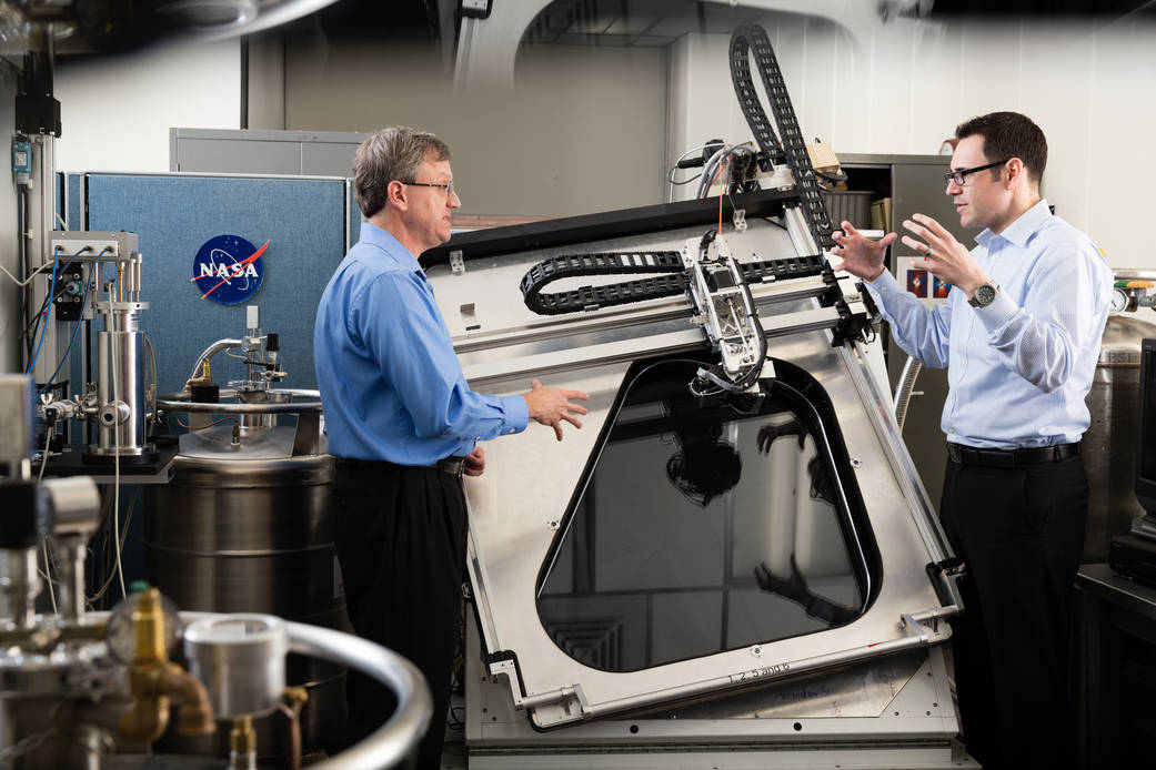 A Rollins College student talks to a NASA Scientist
