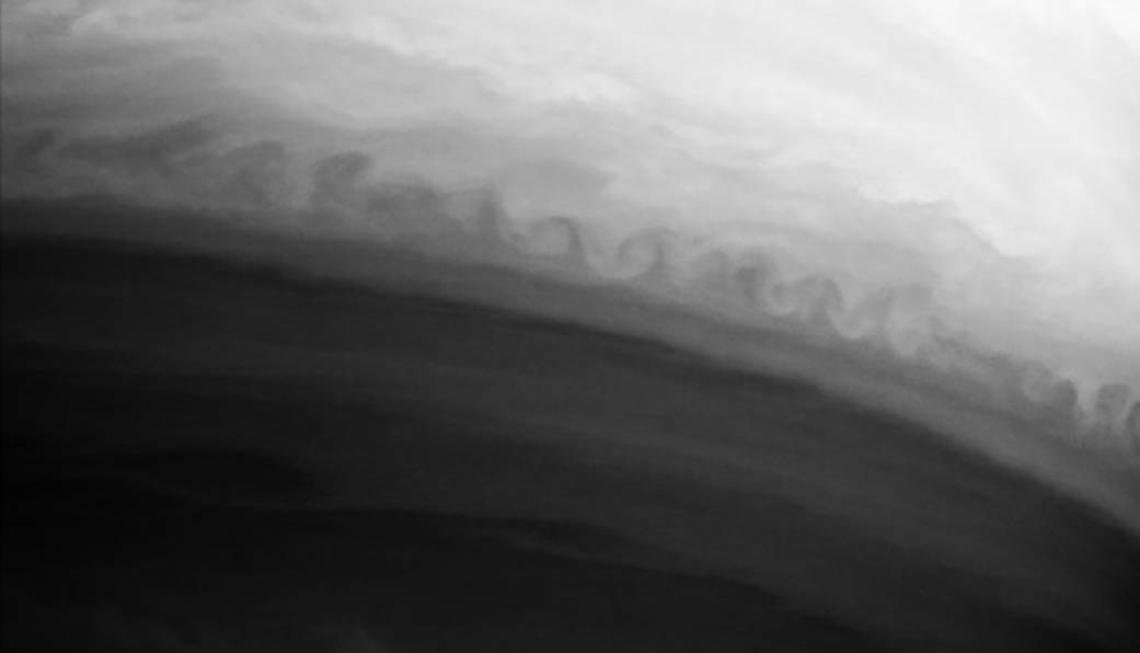 A pattern of an iconic surfer's wave seen here in the atmosphere of Saturn as captured by NASA's Cassini mission.