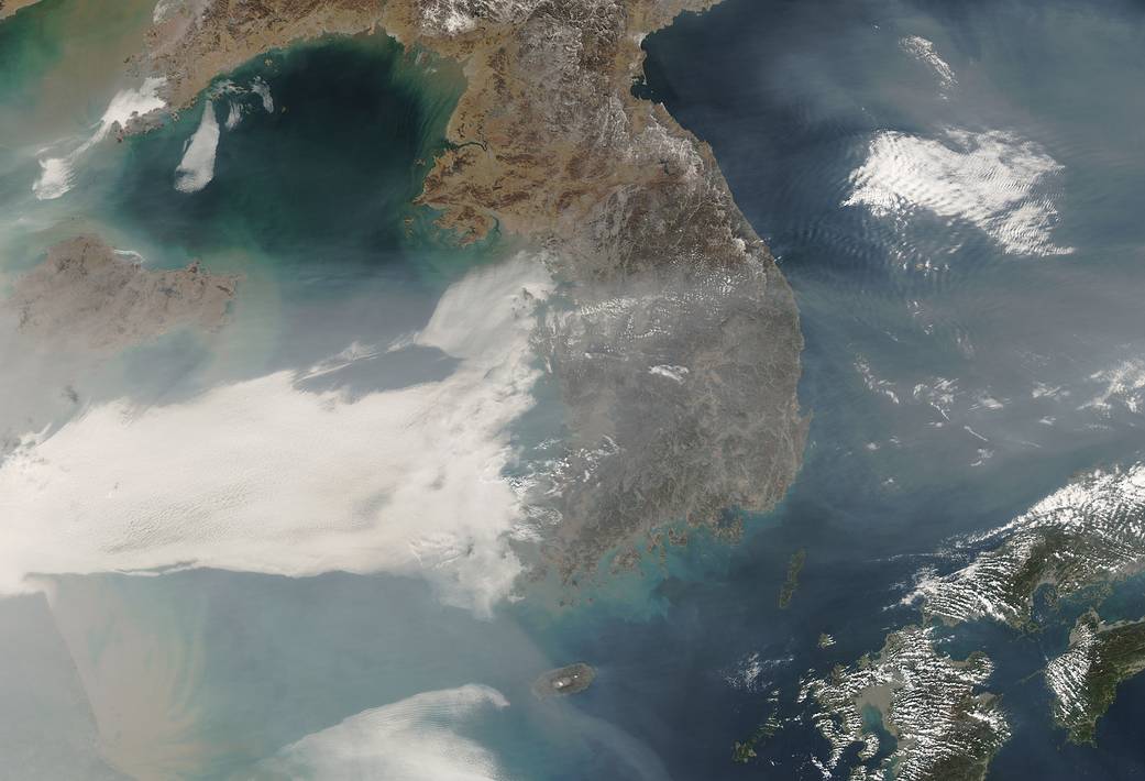 This 2007 satellite image shows a swath of air pollution sweeping east across the Korean peninsula to Japan.