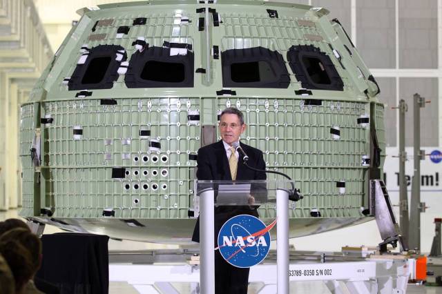 NASA Kennedy Space Center Director Robert Cabana addresses the audience assembled in Kennedy Space Center's Operations and Checkout Building high bay for an event marking the arrival of NASA's first space-bound Orion capsule in Florida.