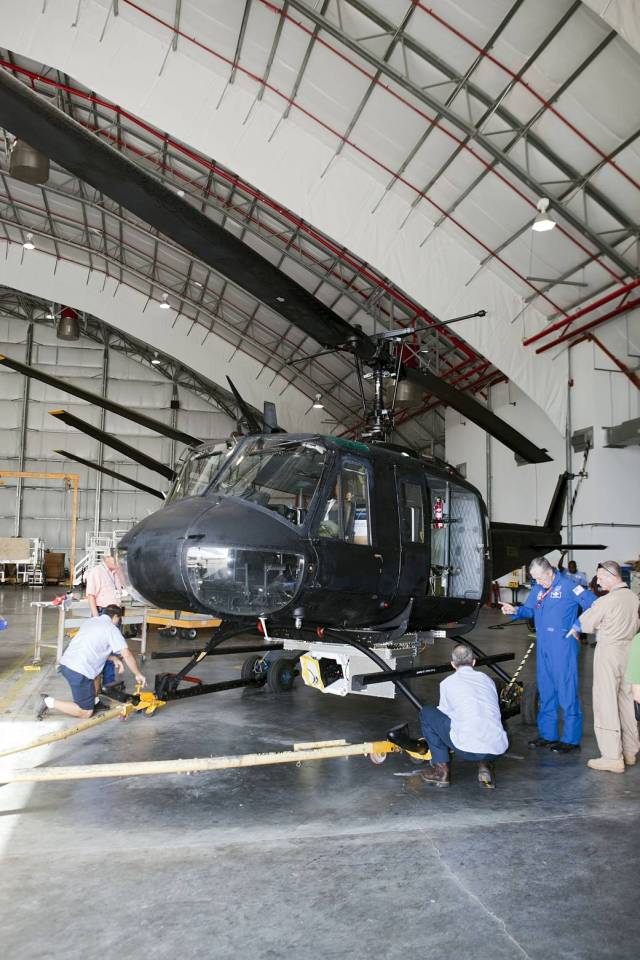 Near the Shuttle Landing Facility at NASA's Kennedy Space Center in Florida, a space agency team installed and tested hazard avoidance instrumentation on a Huey helicopter. 