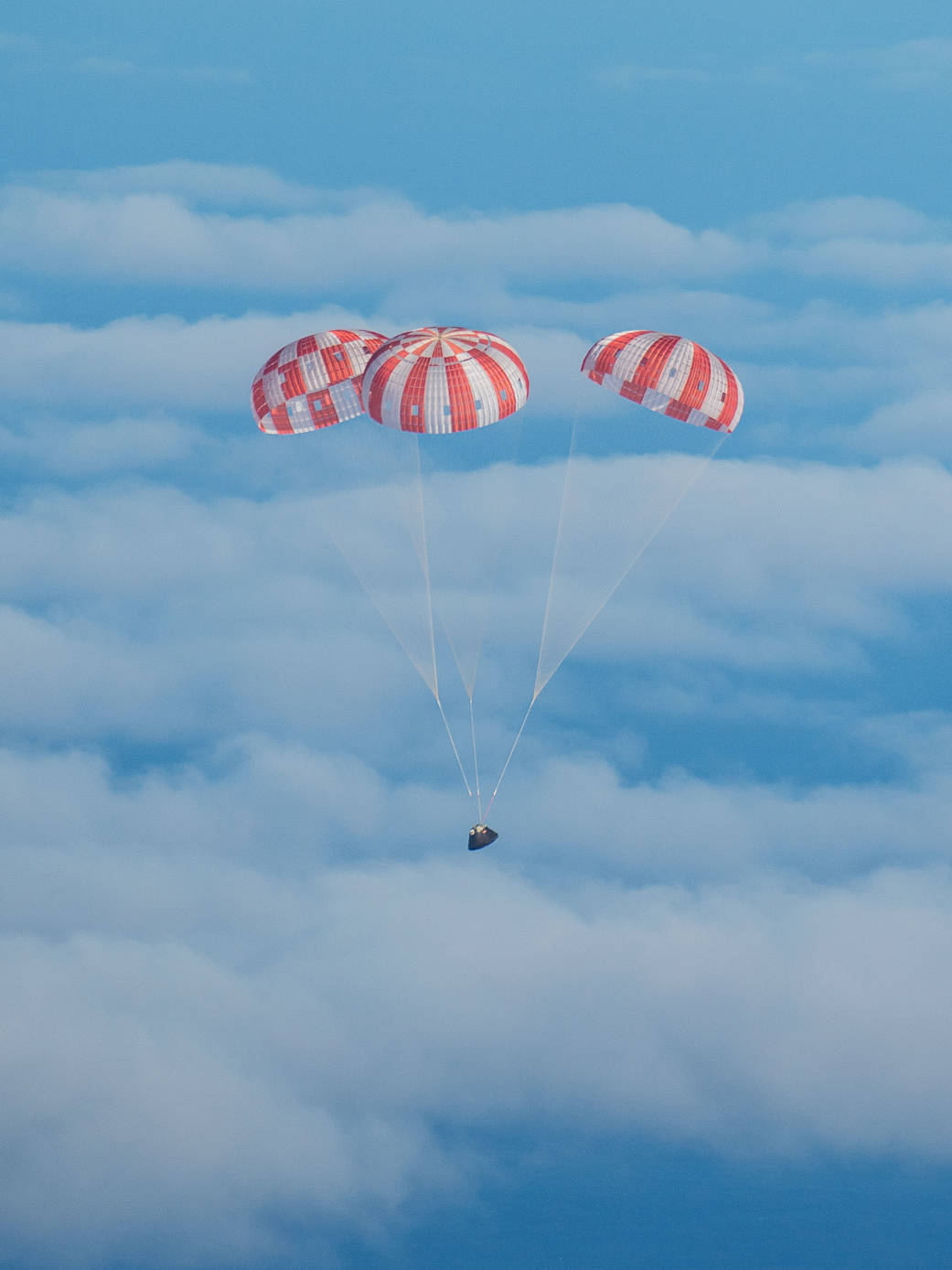 Orion Glides Through Clouds