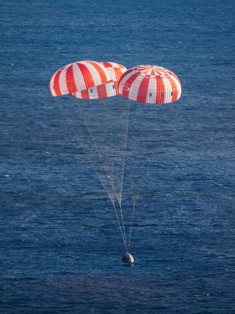 Orion Under Three Main Parachutes