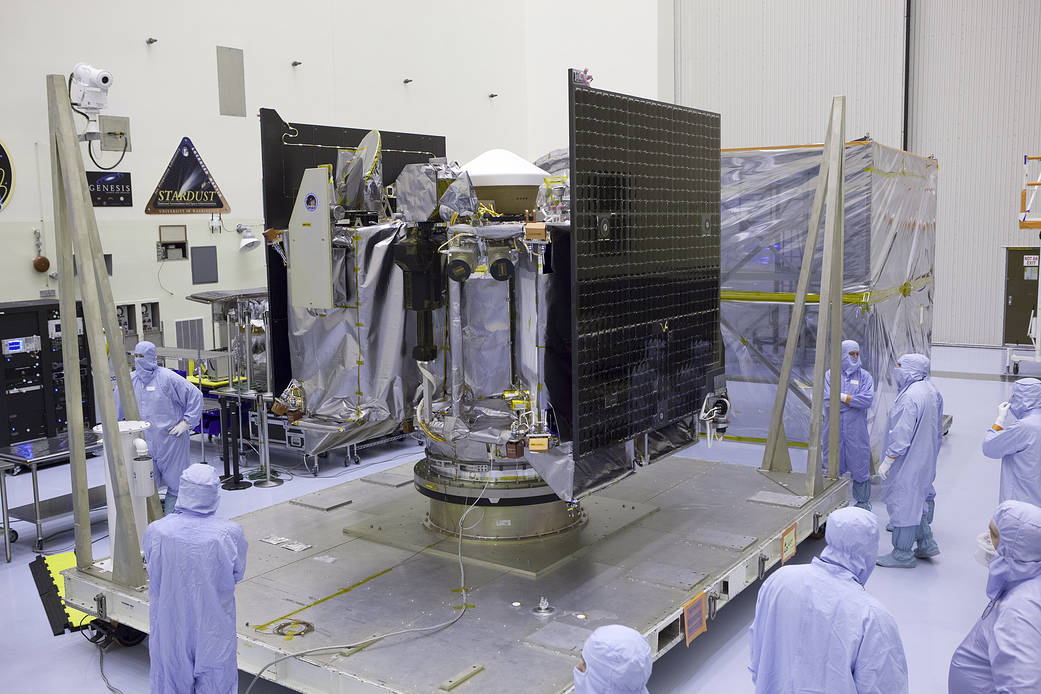 OSIRIS-REx spacecraft in clean room surrounded by technicians