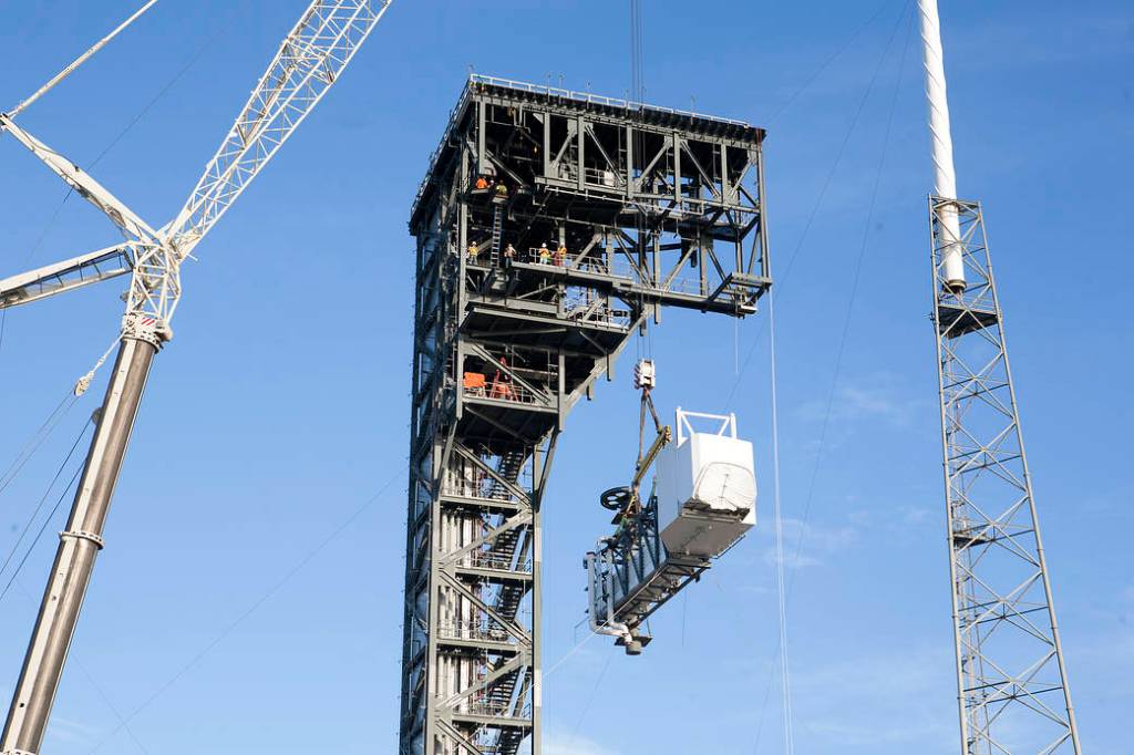 Crew Access Arm Lifted into Place