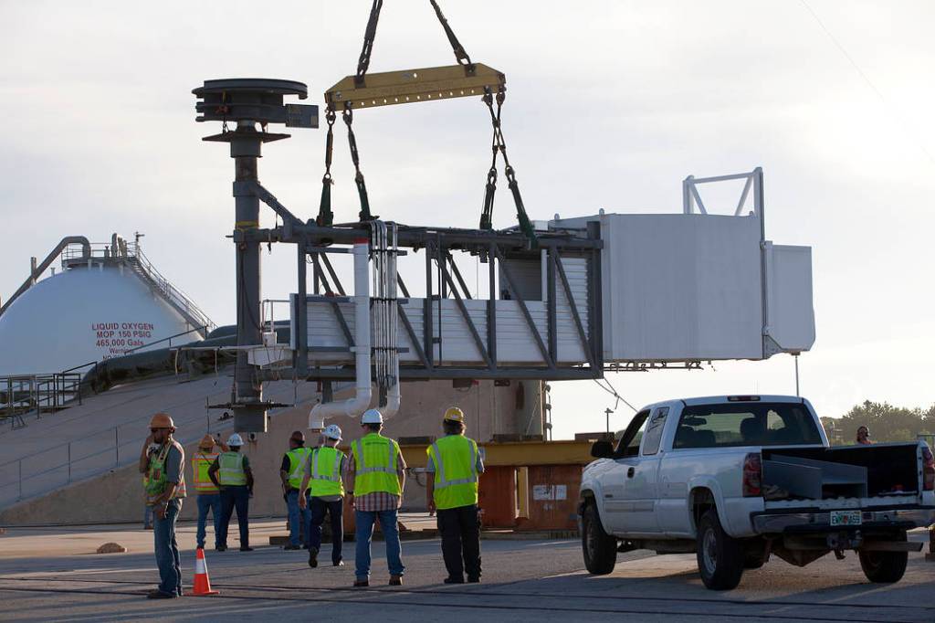 Crew Access Arm Lifted for Attachment to Tower