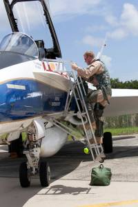 A NASA pilot boards an F-18 jet prior to take off from the agency's Shuttle Landing Facility at NASA's Kennedy Space Center in Florida.