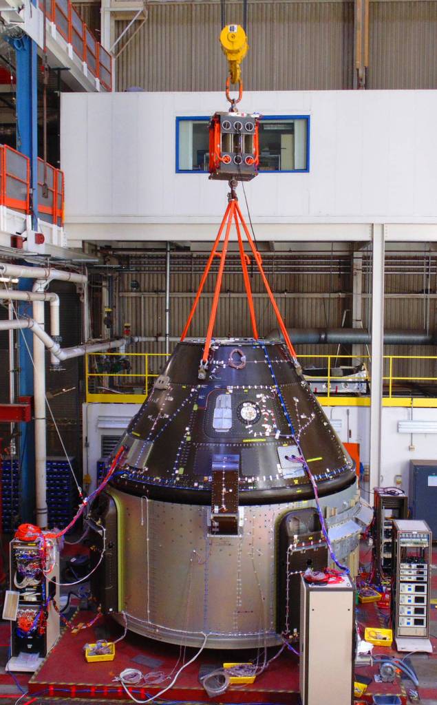 A Starliner structural test article at Boeing's Huntington Beach Facility in California, where the spacecraft is undergoing rigorous qualification testing, including tests like shock, separation and vibration. 