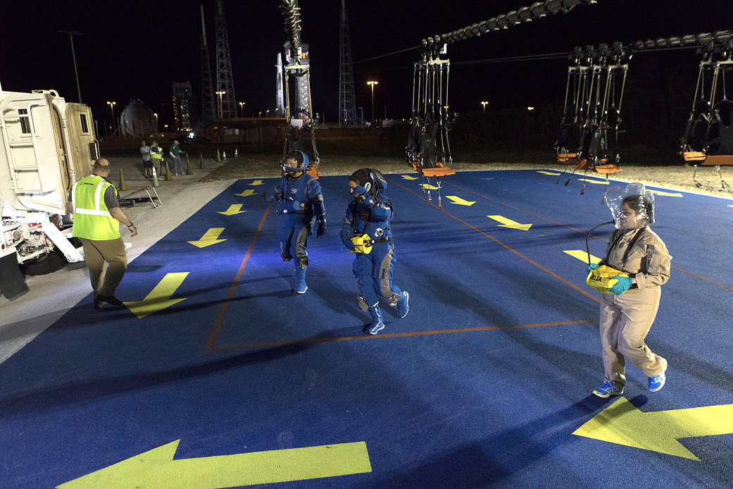 Astronauts participate in a Boeing/United Launch Alliance (ULA) emergency egress system demonstration at Cape Canaveral Air Force Station’s Launch Complex 41 in Florida on June 19, 2018.