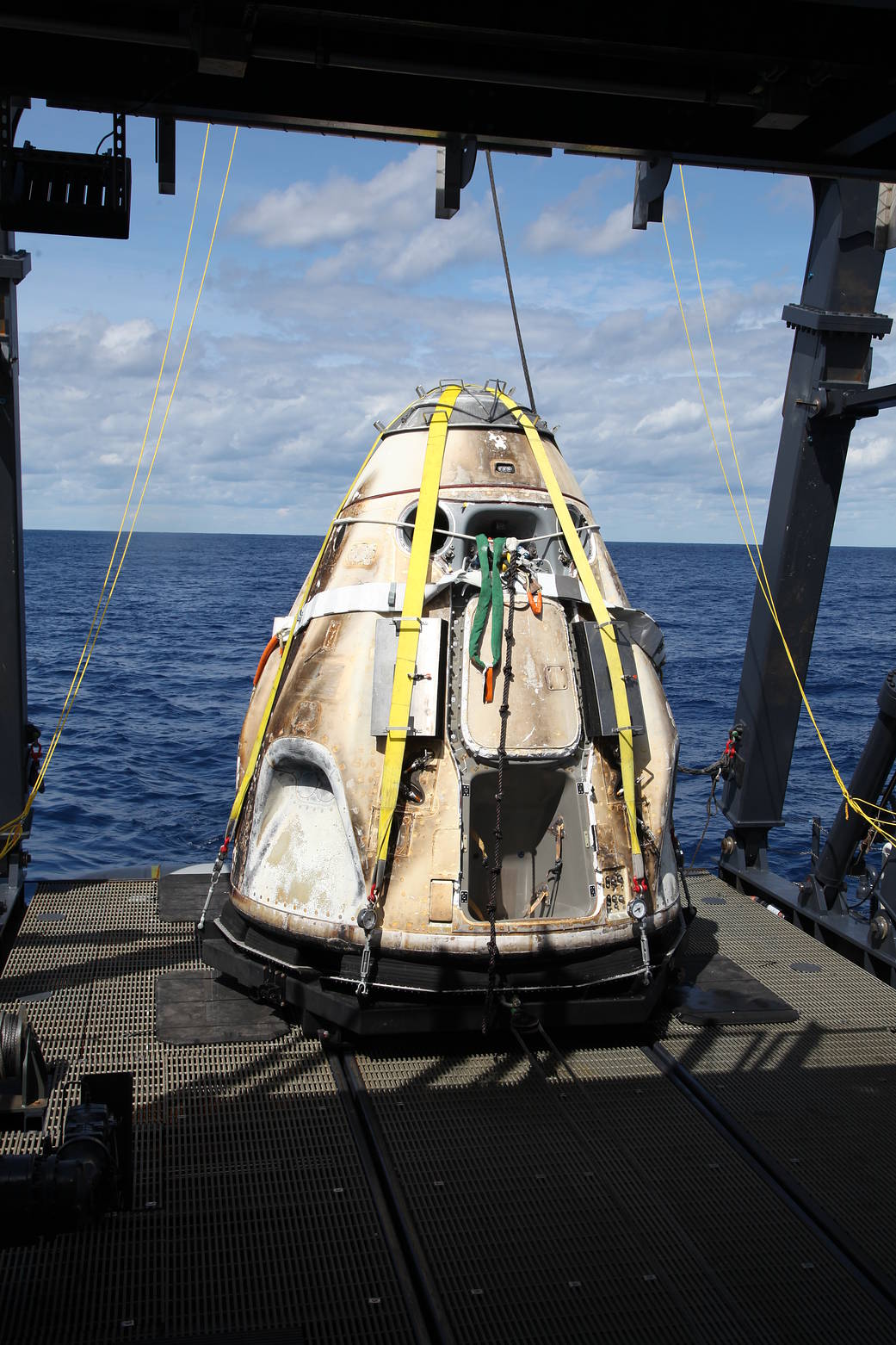 SpaceX’s Crew Dragon is loaded onto the company’s recovery ship, Go Searcher, in the Atlantic Ocean, about 200 miles off Florida’s east coast, on March 8, after returning from the International Space Station on the Demo-1 mission. 