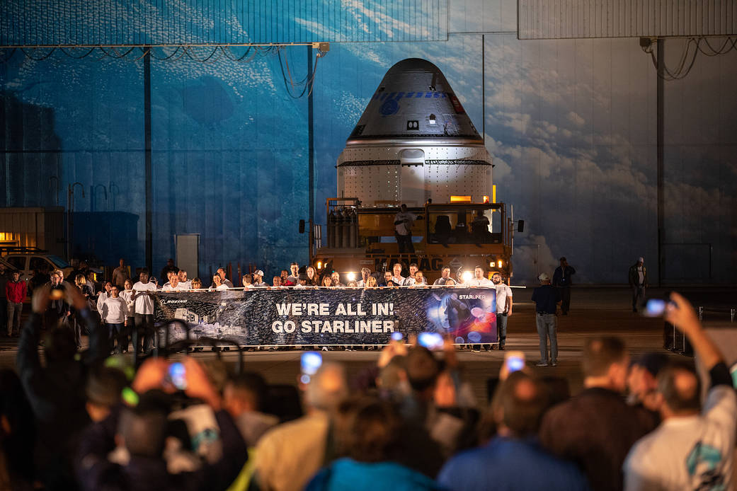 The Boeing CST-100 Starliner spacecraft rolls out from the company’s Commercial Crew and Cargo Processing Facility at NASA’s Kennedy Space Center in Florida on Nov. 21, 2019.