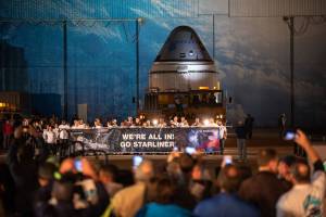 The Boeing CST-100 Starliner spacecraft rolls out from the company’s Commercial Crew and Cargo Processing Facility at NASA’s Kennedy Space Center in Florida on Nov. 21, 2019.