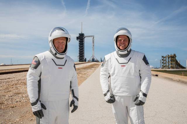 NASA astronauts Douglas Hurley (left) and Robert Behnken (right) participate in a dress rehearsal for launch at the agency’s Kennedy Space Center in Florida on May 23, 2020.