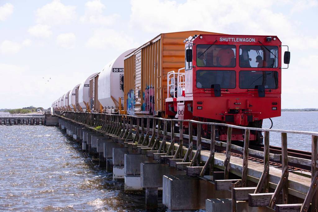 A train transporting the 10 booster segments for NASA’s Space Launch System rocket