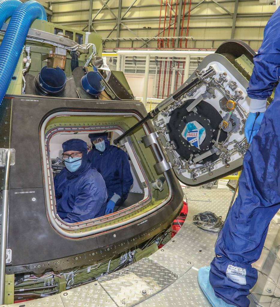 NASA astronauts Barry “Butch” Wilmore, left, and Sunita "Suni" Williams visit the Commercial Crew and Cargo Processing Facility at Kennedy Space Center in Florida on Dec. 17, 2020. 