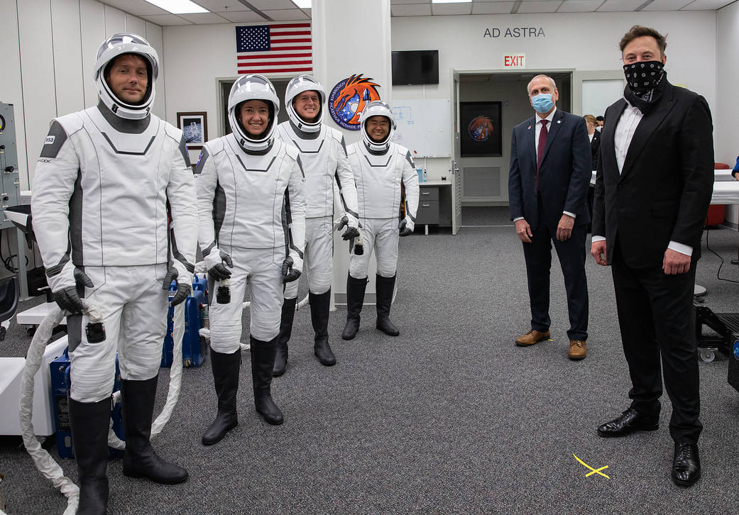 SpaceX CEO and founder Elon Musk and NASA acting administrator Steve Jurczyk visit with the SpaceX Crew-2 astronauts inside the crew suit-up room at Kennedy Space Center.